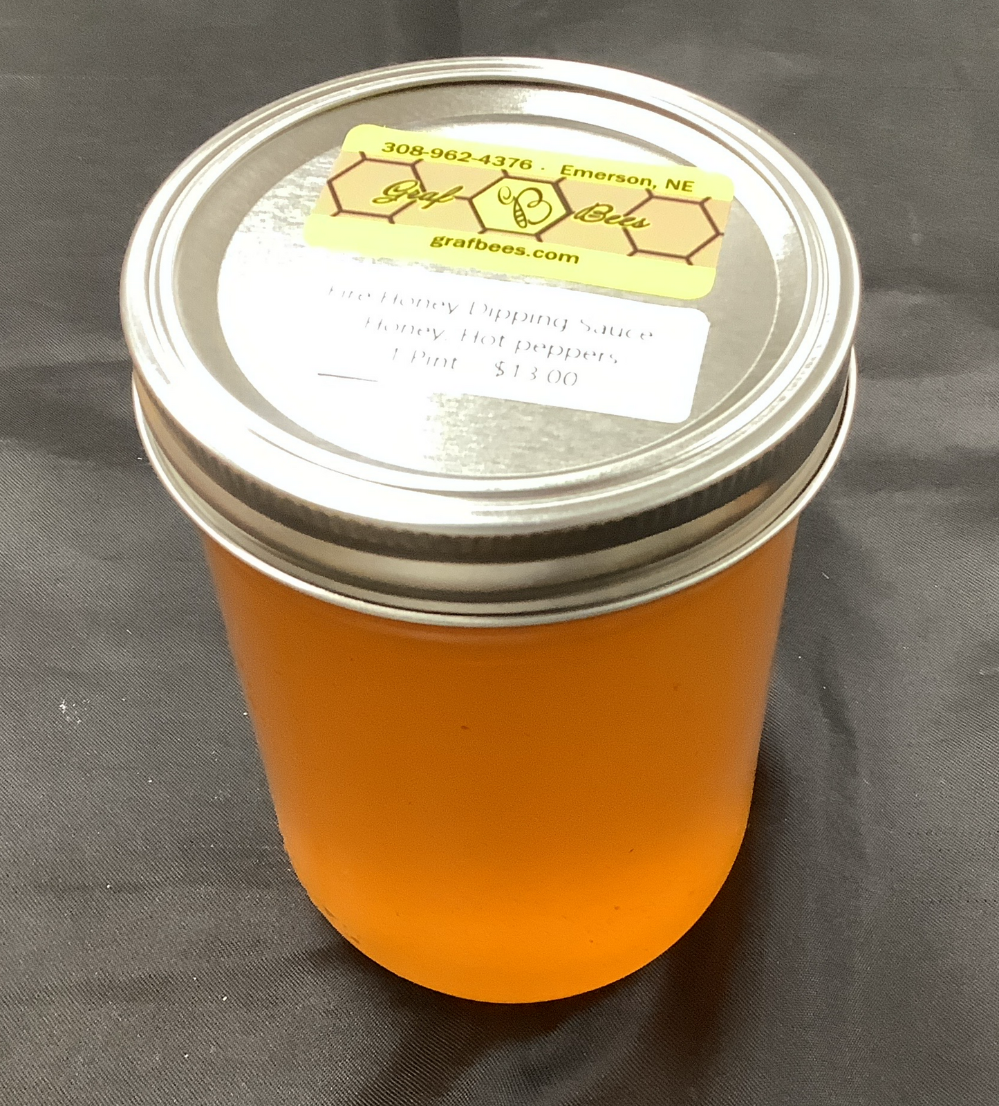Mason jar of hot infused honey dipping sauce