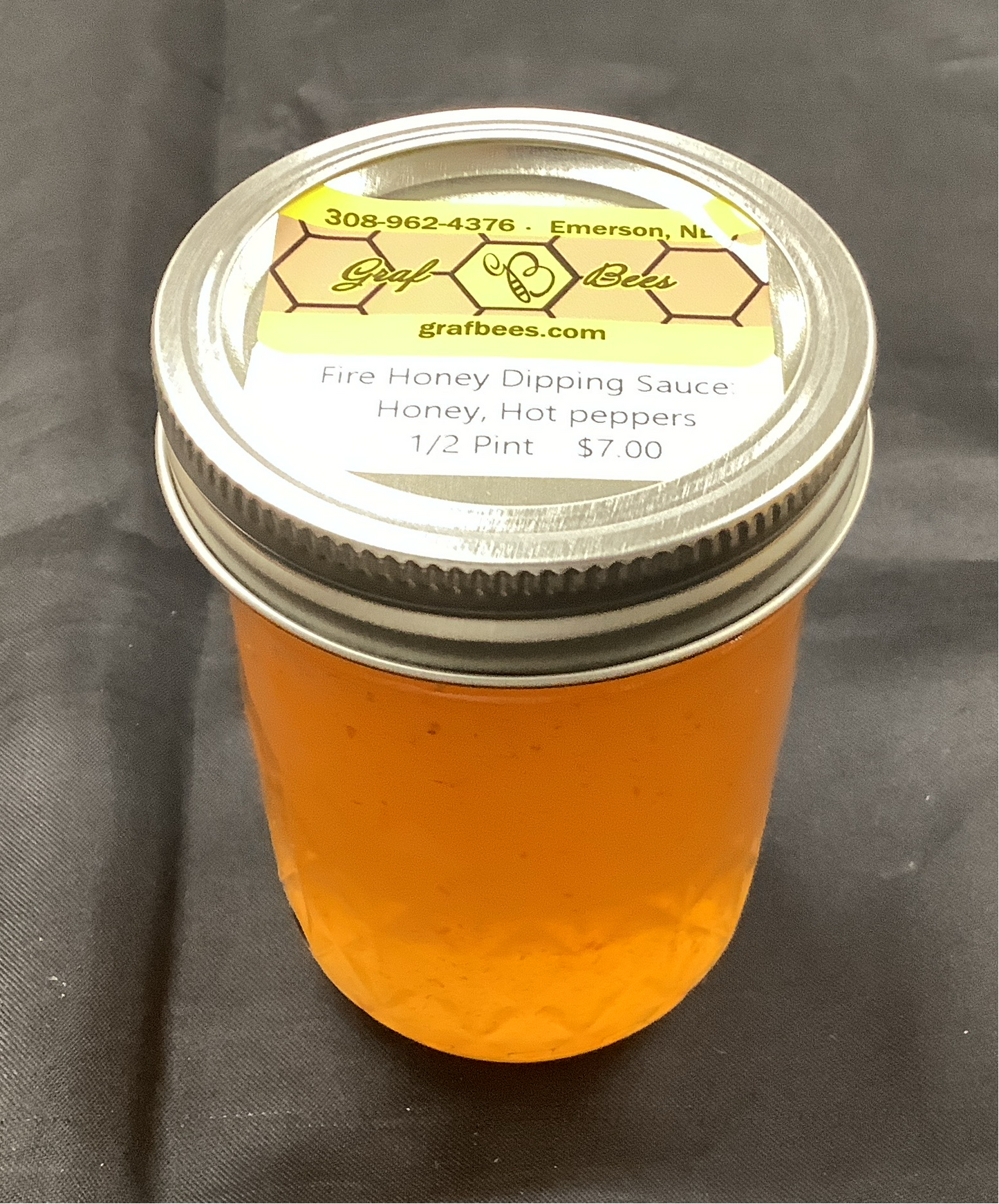 Mason jar of hot infused honey dipping sauce