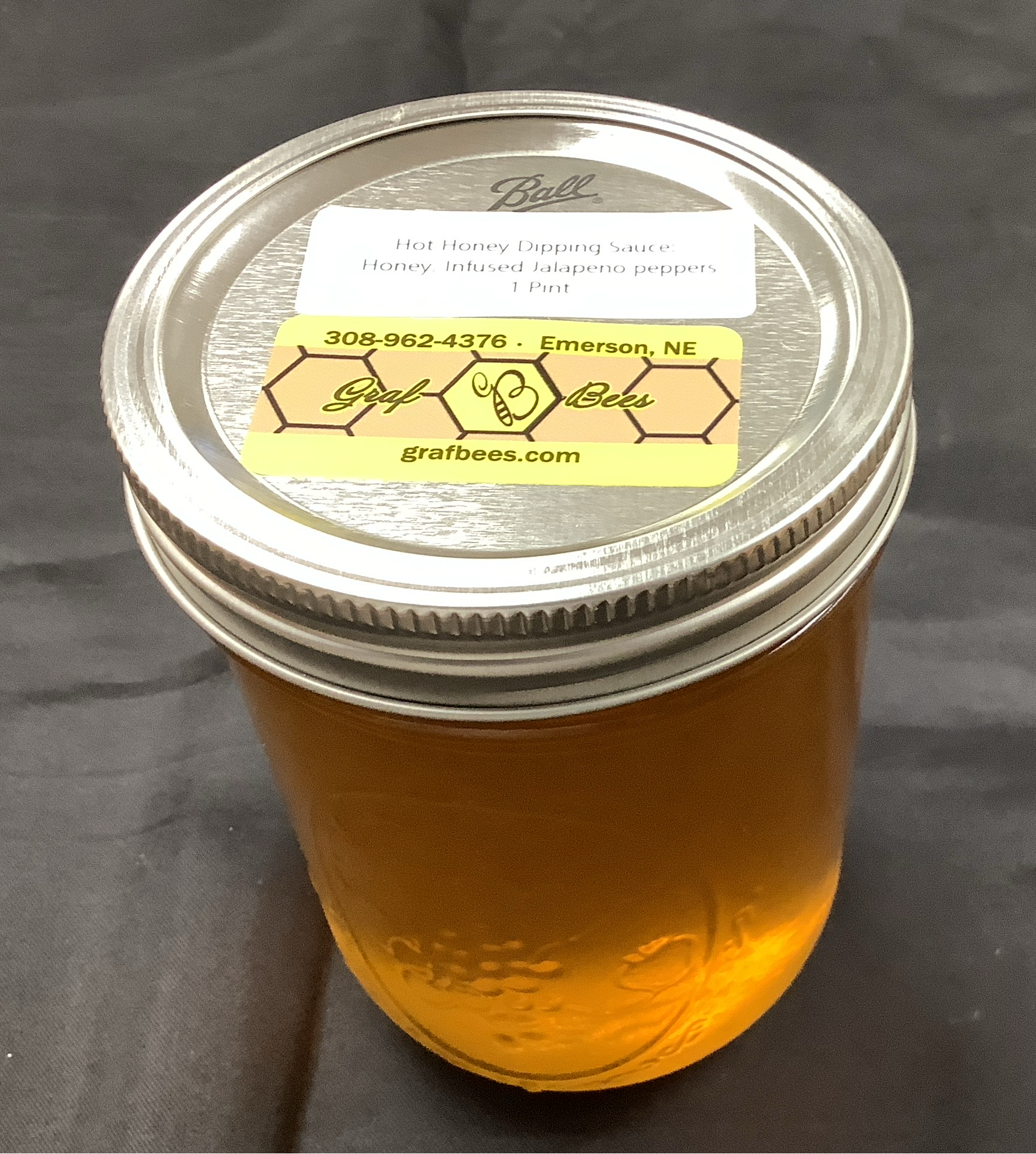 Mason jar of hot infused honey dipping sauce