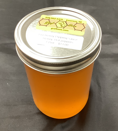 Mason jar of hot infused honey dipping sauce